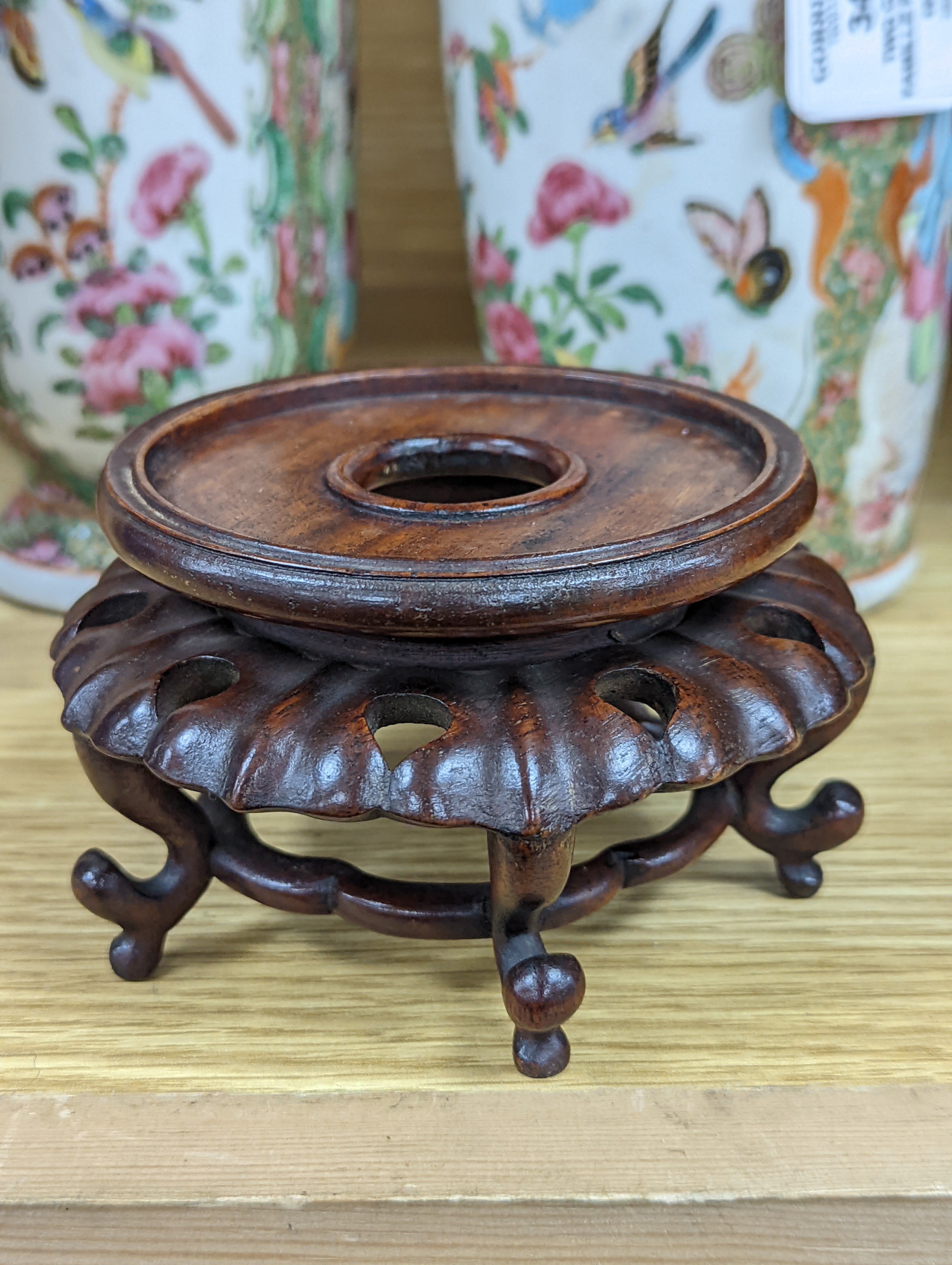 Two Chinese famille rose vases, late 19th century, tallest 26 cm, one wood stand, some restoration